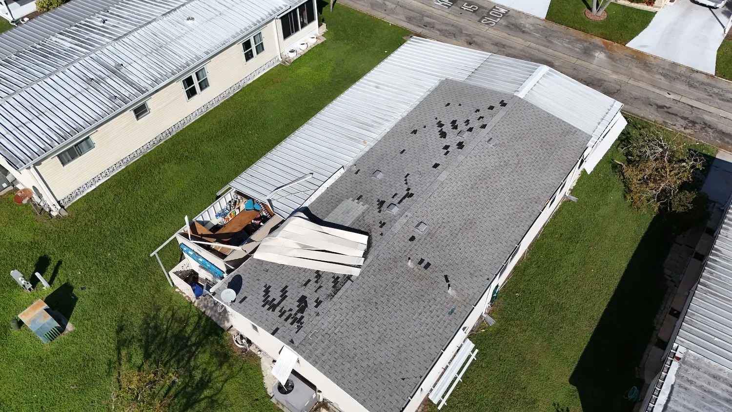Wind Damage Roof Repair in Olathe, KS
